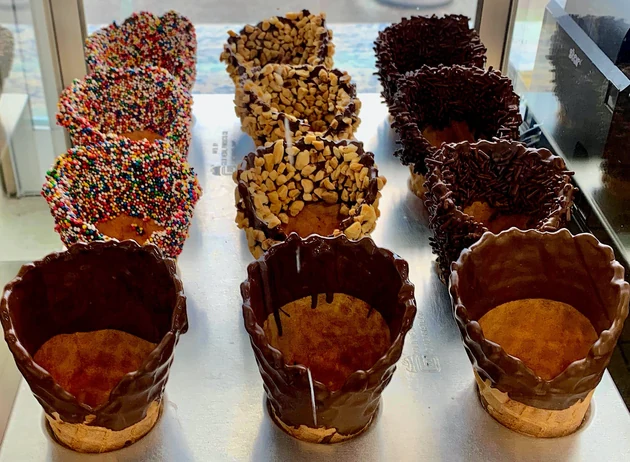 Chocolate-dipped waffle cones with rainbow sprinkles or chopped peanuts